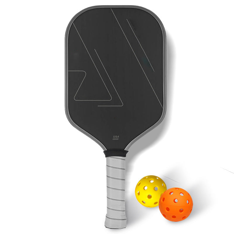 Pickleball paddle with balls
